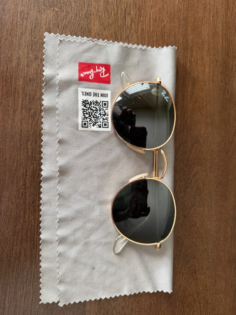 Ray-Ban Thin Gold Rimless Eyeglass Frame with Clear Temples